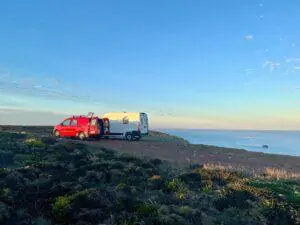 Couple enjoying a campervan road trip in the Algarve 2026